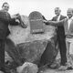 Orange County Harbors Director Ken Sampson, County Harbor Engineer Jim Ballinger and breakwater contractor Ernie Silberberger place time capsule in rock at Dana Point Harbor, Oct. 1, 1968. (Orange County Archive)